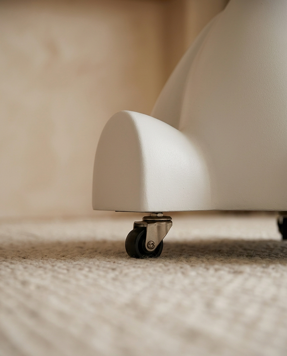 Movable Mini Side Table — close detail of the castor wheel and leg base